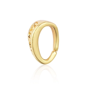 Detailed close-up of a gold-plated ear cuff with micro-pave cubic zirconia inlay