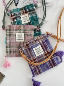 Retro plaid crossbody bag with fringe tassels and woven strap in multiple pastel colors