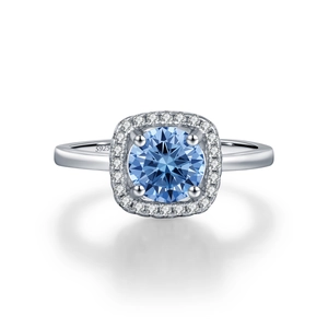Vintage S925 silver halo ring featuring a round blue moissanite and pave diamonds
