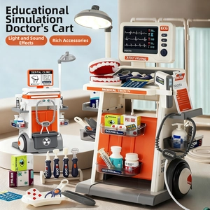 Close-up of kids medical play cart with simulated X-ray monitor and dental tools