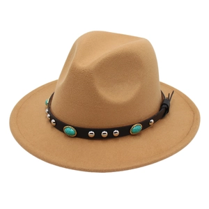 Close-up of camel wool fedora hat with turquoise gemstone and leather band detail