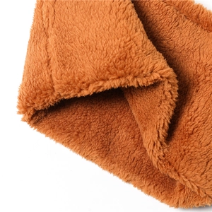 Close-up of the soft brown coral fleece fabric showing the warm and fluffy texture