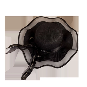 Black wide brim straw hat with wavy edge and love ribbon decoration for sun protection