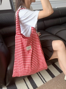 Red and white gingham plaid tote bag with shoulder strap for casual autumn style