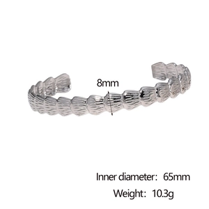 Detail view of 8mm silver textured open cuff bangle with size and weight dimensions