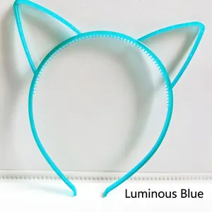 Close-up of blue cat ear headband with non-slip teeth and luminous glow-in-the-dark finish