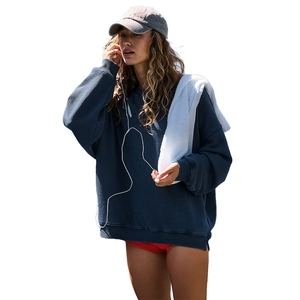 Detail of navy blue oversized crewneck sweatshirt fabric and loose athletic fit style