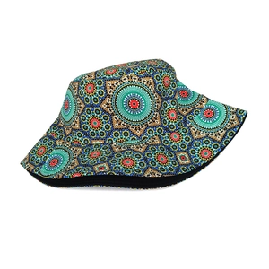 Detailed view of colorful mandala pattern print on reversible cotton bucket hat fabric