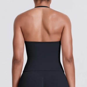Close-up back view of black seamless halter sports bra with sexy open back design