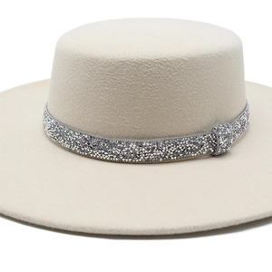 Elegant beige wool felt boater hat featuring a luxury silver rhinestone headband trim