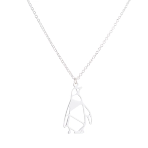 Close-up of minimalist silver penguin pendant with a hollow geometric origami design