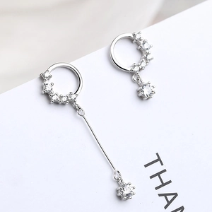 Asymmetric silver evil eye drop earrings with sparkling white zircons for women