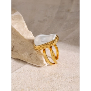 Elegant 18k gold stainless steel open ring featuring a unique baroque pearl centerpiece