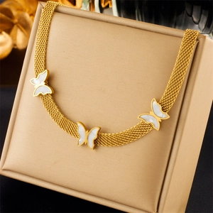 Elegant gold woven chain necklace with three white butterfly pendants in a gift box