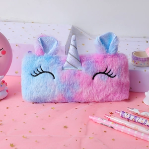 Detailed view of plush unicorn pencil case with pink-blue gradient fur and sequined horn