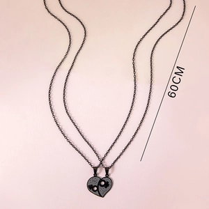 Couples puzzle heart necklace set in zinc alloy with black chains and Spanish romantic text