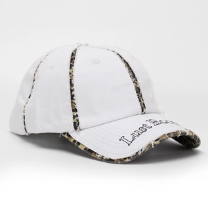 Detailed embroidery on white baseball cap with leopard print trim and frayed edges