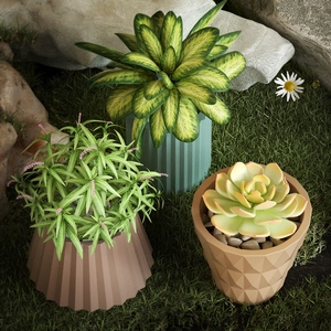 Detailed arrangement of DIY resin succulent pots with textured geometric finishes