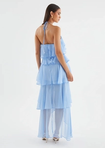 Back view of light blue halter neck tiered maxi dress with ruffles for summer