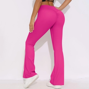 Close-up of pink high-waisted flared yoga pants with back scrunched butt lifting detail