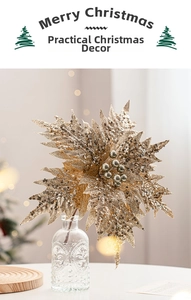 Detail of golden sequin Christmas flower with metallic berry core in a glass vase