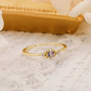 Detailed macro shot of a S925 silver vintage ring with a violet tanzanite gemstone
