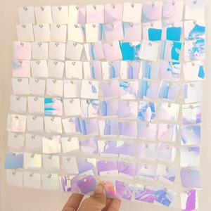 Close-up of square iridescent wind-driven sequin panel for party backdrop decorations