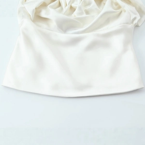 Elegant white satin backless blouse for women with a silky smooth texture and bow detail