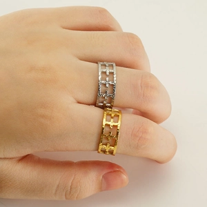 Classic titanium steel hollow geometric rings set in gold and silver for women