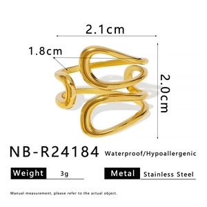Detailed size measurement of a gold geometric cutout star ring in stainless steel