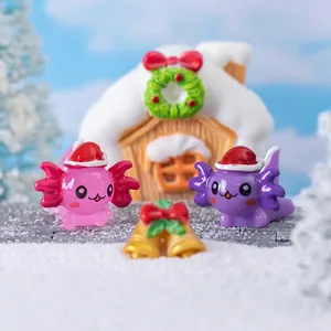 Miniature Christmas axolotl figurines with Santa hats and golden bells for DIY decor