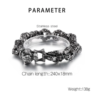 Macro detail of gothic skull bracelet showing stainless steel texture and dimensions