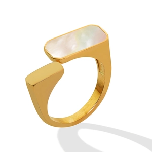 Minimalist gold open ring with rectangle white sea shell inlay on white background