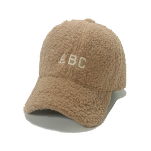 Brown teddy fleece baseball cap with ABC embroidery for winter season in minimalist style