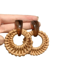 Bohemian geometric vine earrings with vintage brown resin and natural woven straw detail