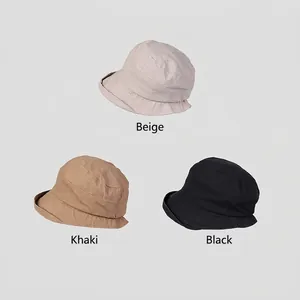 Washable cotton bucket hats in beige, khaki, and black with a natural rolled edge