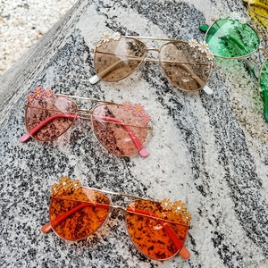 Daisy flower pilot sunglasses for children in brown pink orange and green colors