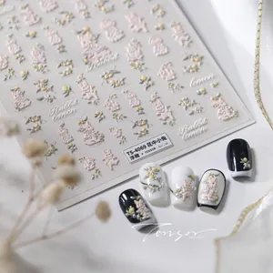Macro detail of TS-4069 3D embossed nail stickers featuring cute rabbits and lemon flowers