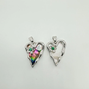 Silver-toned heart pendant set featuring natural abalone and white mother of pearl shell