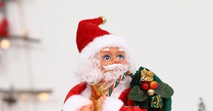 Close-up of plush Santa Claus figure with red velvet hat and detailed white beard