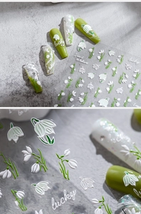 Détail de stickers ongles 3D avec muguet blanc et texte lucky pour manucure