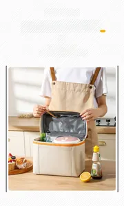 Close-up of insulated lunch bag with top mesh pocket and dual zipper large opening