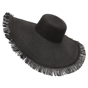 Detail shot of black woven straw sun hat showing intricate fringe edges and texture