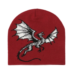 Close-up of the knitted dark red beanie featuring a white dragon graphic pattern
