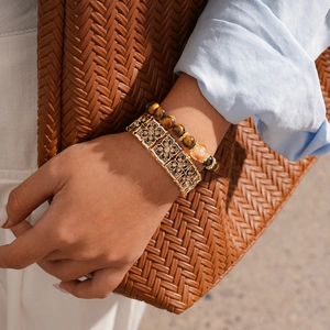 Retro gold metal hollow bangle and tiger eye bead bracelet set for women