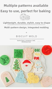 Detail of Christmas cookie molds showing reindeer and Santa Claus fondant patterns
