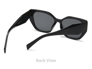 Detail view of large cat-eye sunglasses with polished black frames and model specs