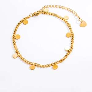 Detailed macro view of 18k gold plated stainless steel chain with heart and disk charms