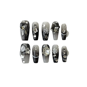 Handmade press-on nails with black grey gradient, glitter snowflakes and crystal charms
