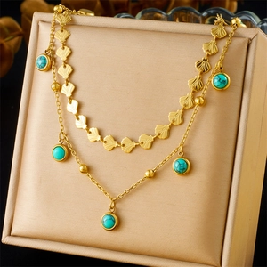Double-layered gold titanium steel necklace with turquoise star pendants and shell accents